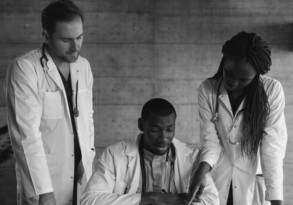 Doctors discussing over a desk