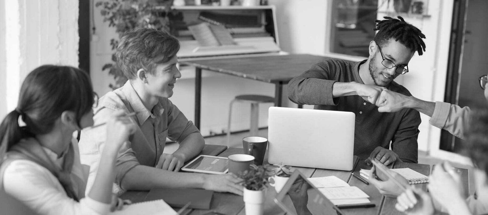 Coworkers sitting around a table
