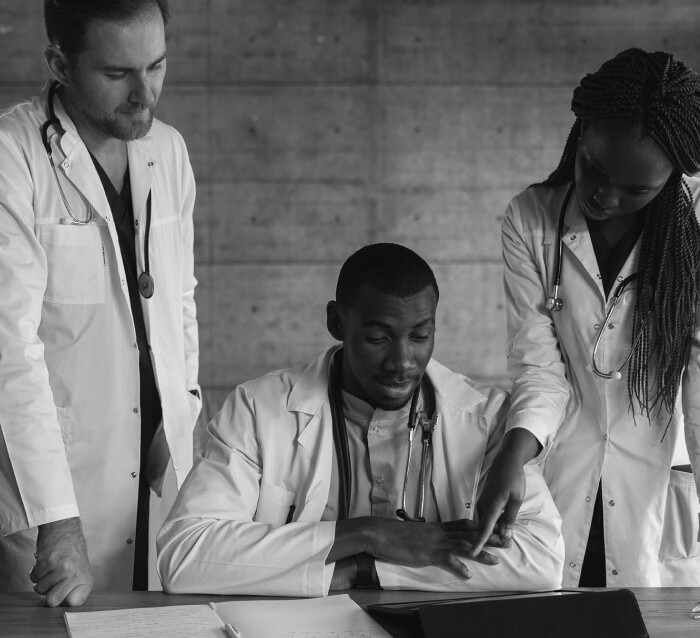 Doctors discussing over a desk