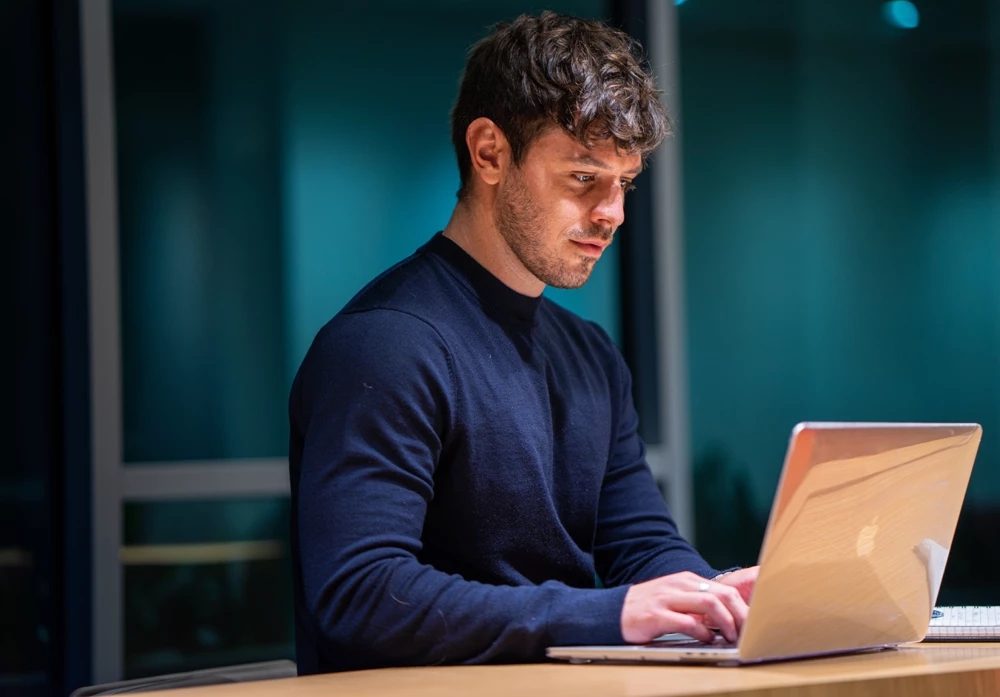 Young man working on laptop