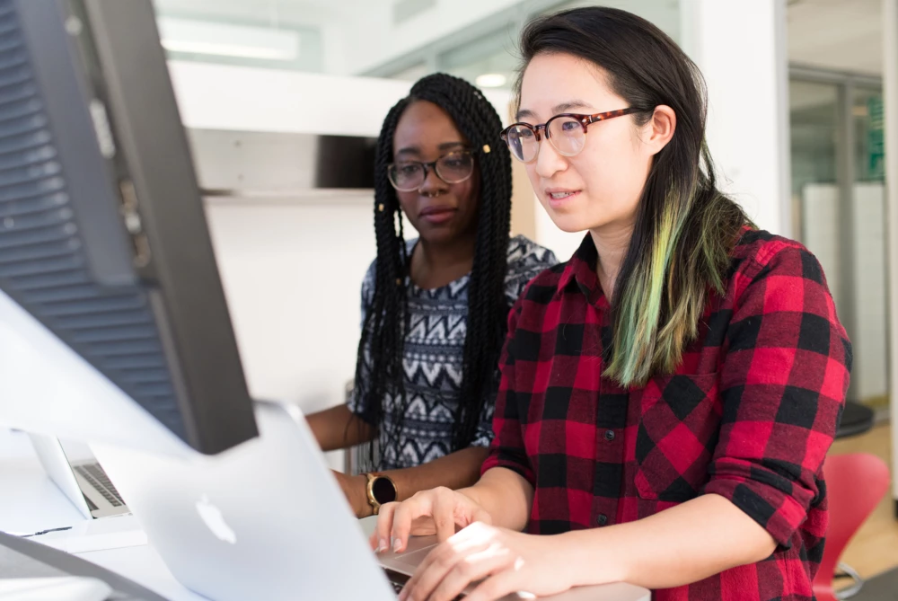 Women looking at computer