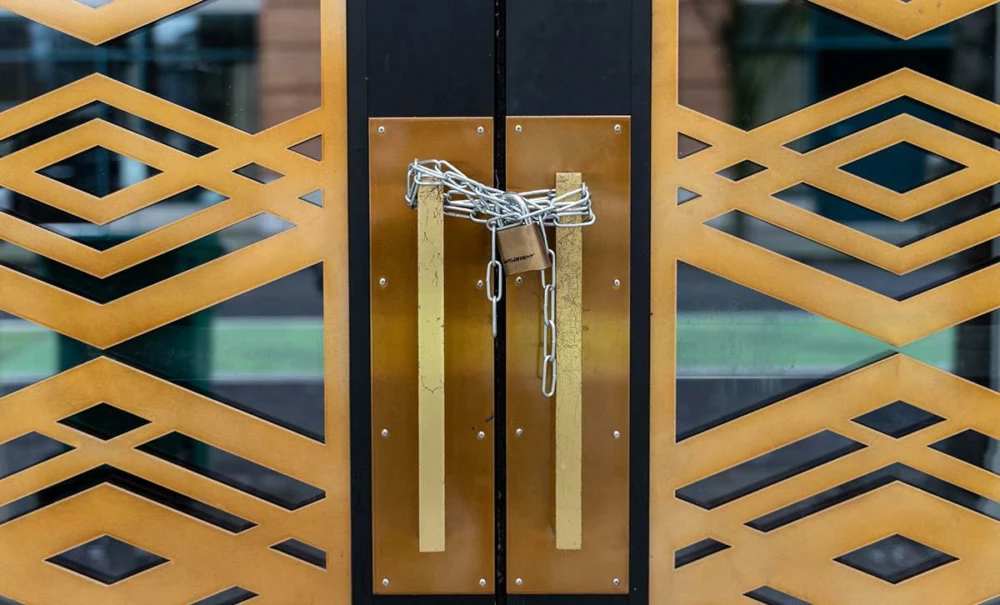 Locked double doors with a heavy chain