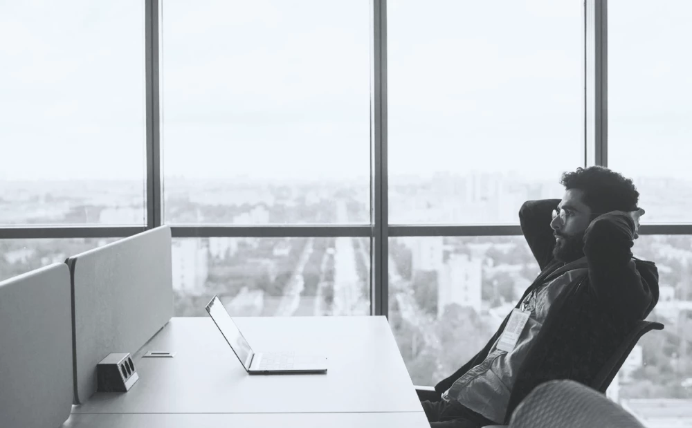 Man at desk with laptop